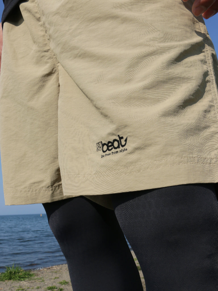 &beat 刺繍ナイロンパンツ